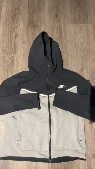 grey and black Nike tech, View more