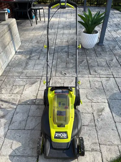 Like New Condition. 18 Volts. 16 Inch Cut. Two Batteries and Charger. Grass Catcher. Never Used. Sup...