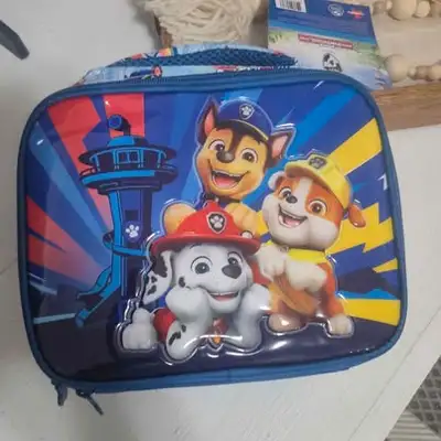New Nickelodeon Paw Patrol lunch bag features Chase, Marshall, and Rubble on a 3D embossed front pan...