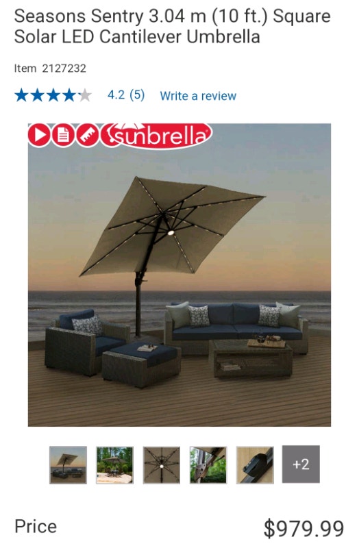 10 foot cantilever umbrella with LED lights and base. New in box Patio & Garden Furniture