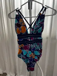Women’s One-piece Swimsuits are $5 each. No Holds
