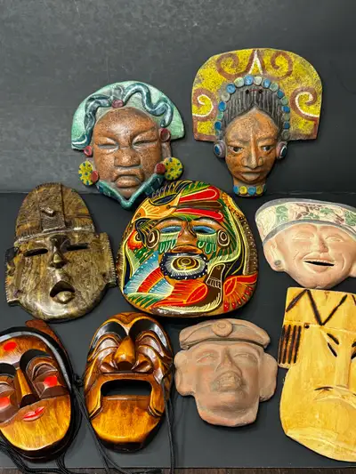 Collection of 9 masks, View more