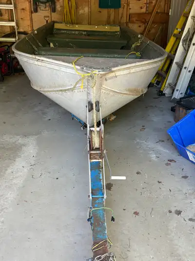14 foot aluminum boat with a 9.9 hp outboard motor and trailer. Posting on behalf of some one. No me...