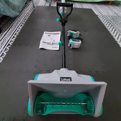 New Battery Powered Snow Blower 12" wide., View more