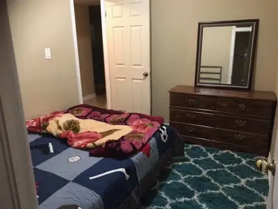 Offering one bedroom in large walkout basement apartment with shared full kitchen, washroom, living...