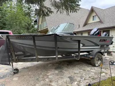 2015 Alumacraft Trophy 175 with Evinrude 150 HO and 9.8 kicker. The whole package looks next to new....