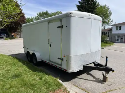 7x16 enclosed trailer with rear barn doors. Has small dent on rear as shown in the pictures. All lig...