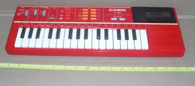 1980s red Casio PT-82 electronic mini synthesizer, Made in Japan, View more