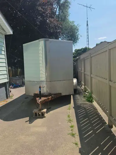 This Royal 15x6J tandem axle cargo trailer is a reliable workhorse, perfect for hauling equipment or...