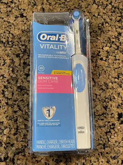 I'm selling a brand new Oral-B Vitality electric toothbrush by Braun, complete with the handle, char...