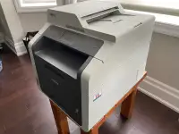 Used Brother All-in-One color laser printer with new cartriges