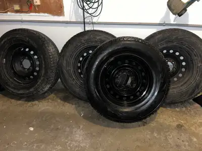 Set of 4 winter tires on 17” steel rims. Size: 265/70R17 (115H) DOT: CX70 750621 Great condition wit...