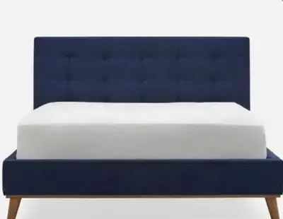 Tufted navy blue upholstered bed frame with wooden legs. Queen size, measuring 89" long and 66" wide...