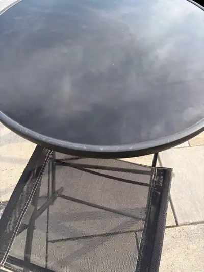 Selling our glass bistro table that folds to stand as well as 2 folding chairs that come with it. In...