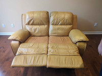 Leather loveseat with opening leg support