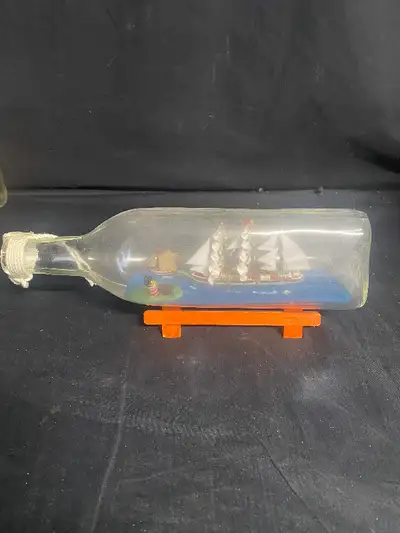 I am selling this 11” long Ship in a Bottle for $25. Someone took the time to make this beauty! It i...