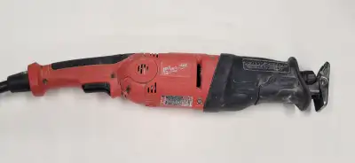 Experience unparalleled cutting power with the Milwaukee Sawzall 'The Hatchet'. This heavy-duty batt...