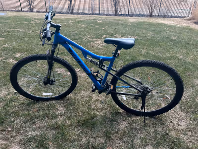 Raleigh Dual Suspension Mountain Bike. 21 speed 29 x 2.25 inch wheels Disk breaks Excellent conditio...
