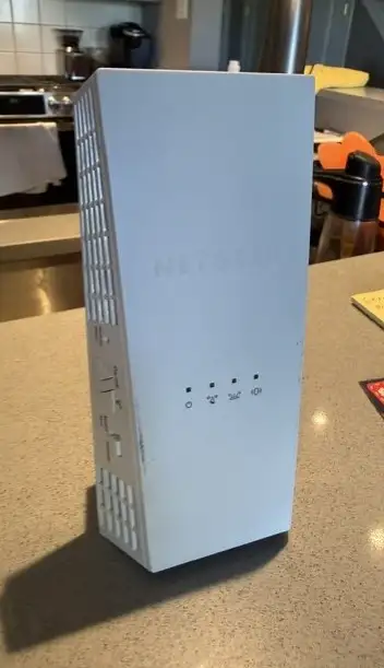 The Netgear AC1900 WiFi Extender - dual-band wireless networking device designed to eliminate dead z...