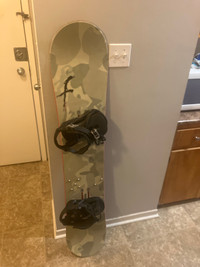 Size 154 Forum snowboard with brand new K2  bindings 