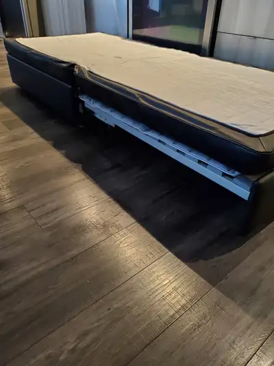Black Italian bonded leather ottomans, View more