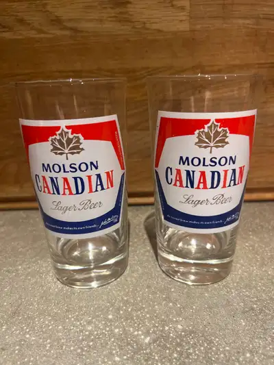 Here are two Molson Canadian Lager Beer glasses ready to be the talk of your next games night! They...