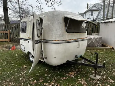 I am looking to buy a fixer-upper small fiberglass trailer like a Boler or Trillium or even a small...