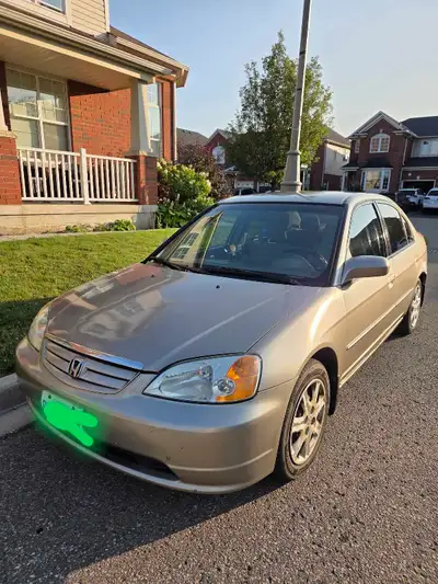 2003 Honda Civic including 4 winter tires Runs and drives great AC and heater works fine Good condit...
