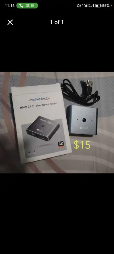 HDMI switch, supports 8K. Includes USB power cable. Grey.