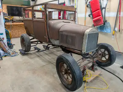 1927 Model T, has original engine, transmission and rear end. Frame was sanded and painted by previo...