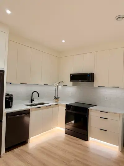 Luxury Fully Furnished Basement Suite with In- Suite Laundry