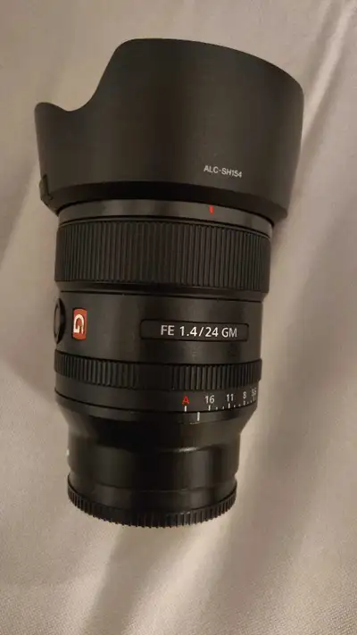 Sony 24mm G master lens F1.4 Will fit Sony full frame and APS-C cameras Fits: Sony a7 A7ii A7iii A7i...