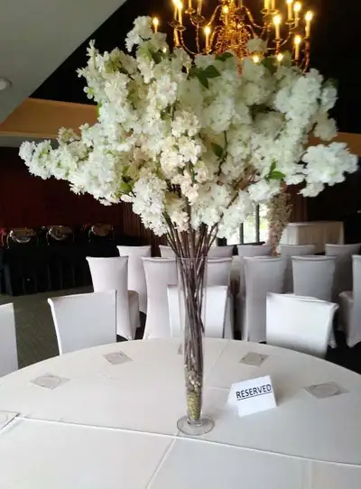 Cherry blossom and greenery centerpieces for rent for $20 to $25 each depending o style for pick up...