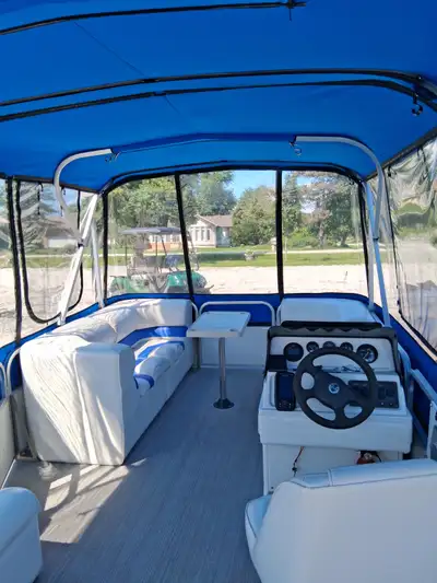 Millennium Odyssey 20' Pontoon boat with full camper canvas (new), mooring cover and trailer with ne...