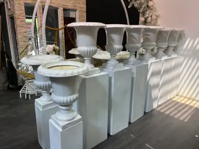 White urns with plinths 8 sets , View more
