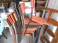 11 plastic chairs with metal frame