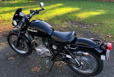 Made in Japan, 2017 Suzuki TU250X with windshield. City motorcycle with cooled 249cc single-cylinder...