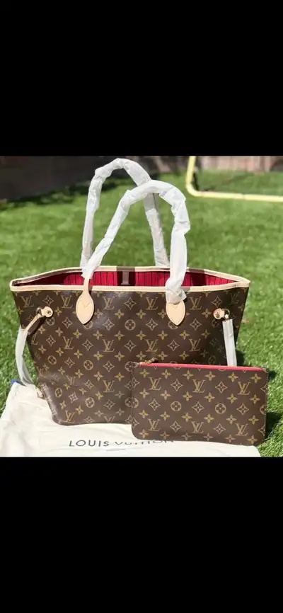 LOUIS VUITTON PURSE, View more