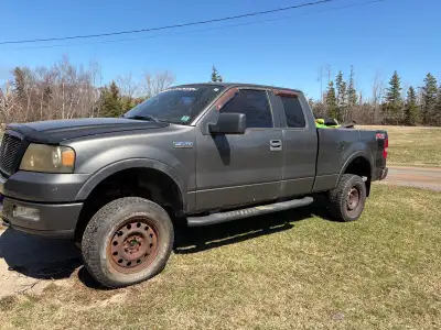 2005 ford f150 for parts or repair has rebuild transmission and southern box also a set of bf all te...