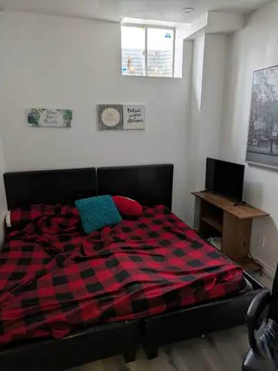 Clean furnished room available immediately close to bus stops...asking $950/month...first and last r...