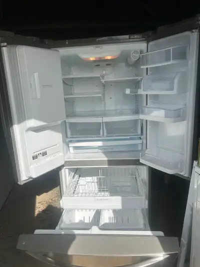 Ice/ water dispenser , bottom freezer , top fridge. In excellent working condition , fresh and clean...