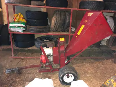 Turn tree branches into useful wood chips. This is a commercial built wood chipper small enough to p...