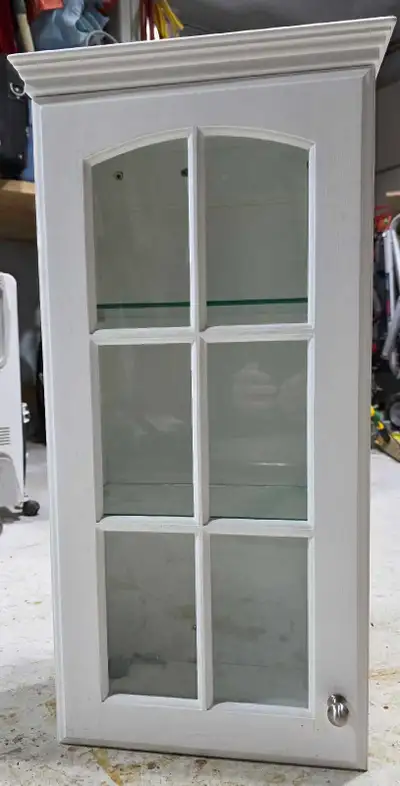 Bathroom wall cabinet w/ glass door and shelves., View more