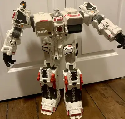 Unleash the action-packed world of Transformers with the Takara Tomy Transformers Generations TG-23...
