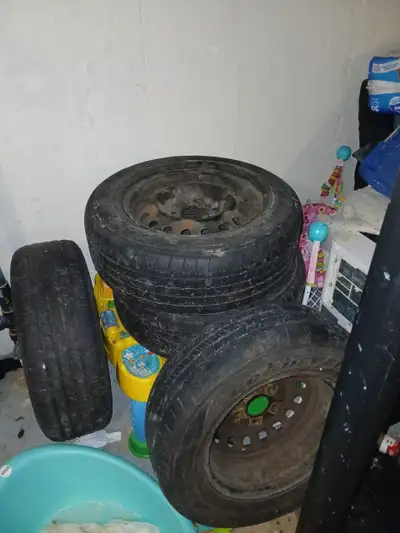 4 tires on rims 70% tread ready to go 70% tread tire needs to be patched 30% tread ready to go 30% t...