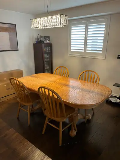Solid Oak Dining room table and 4 Oak chairs, View more