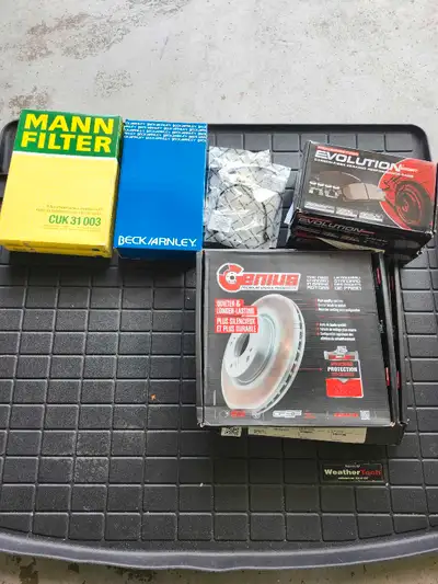 Weathertech trunk mat, 2 cabin filters, 7spd dct trans filter and gasket, front and rear brakes sens...