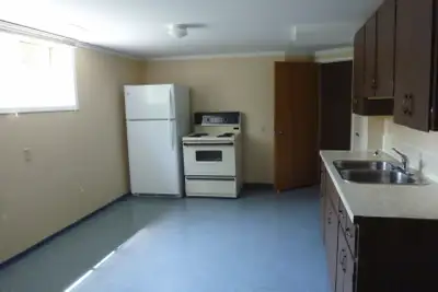 Clean, bright one bedroom fully furnished lower level apartment with private entrance into a very qu...