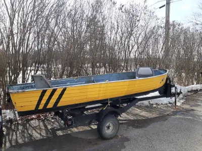 14 ft aluminum boat and trailer. Trailer in very good condition. Lights work. Boat has a very slow l...