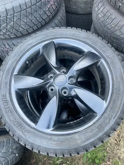 17” OEM Audi A3 wheels with 205-50-17 Bridgestone blizzak WS90winter tires. In good condition. Tires...